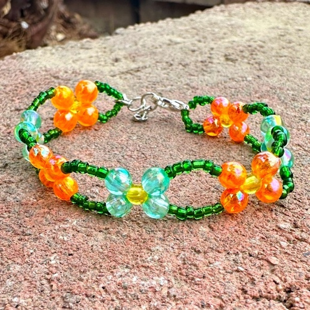 Iridescent Orange and Blue Floral Beaded Bracelet with Silver Colored Accents